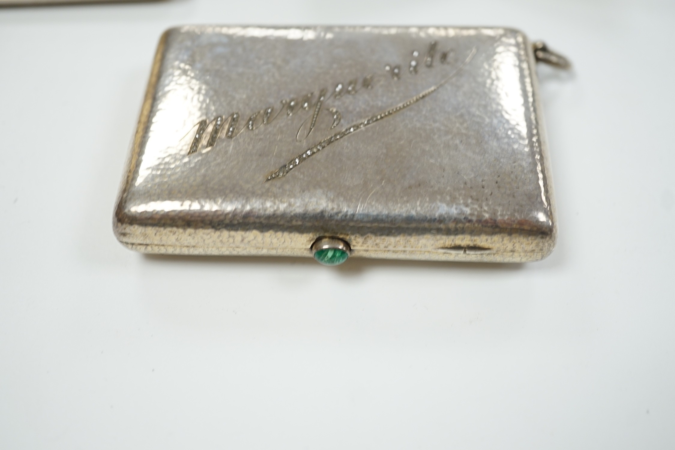 Two George V Art Deco silver and enamel cigarette cases, Birmingham, 1931 & 1932, largest 85mm (enamel a.f. on one) together with a German 800 standard white metal, cabochon emerald and rose cut diamond set compact/minau